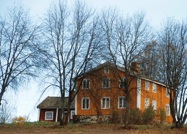 Foto av gammelt, gult hovedhus. Foto: Sjur Harby.